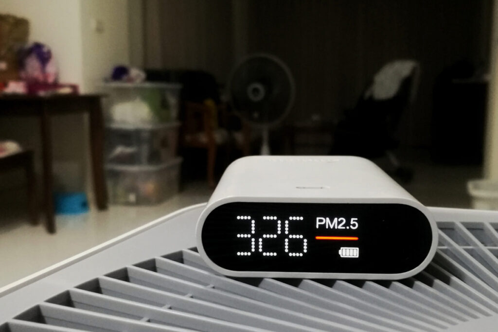 Air Quality Monitor sitting on Air Purifier Vent
