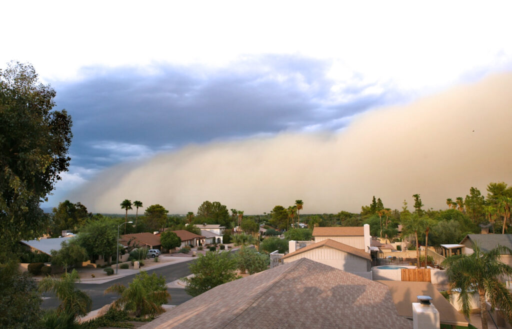 Dust storm rolling over residential area