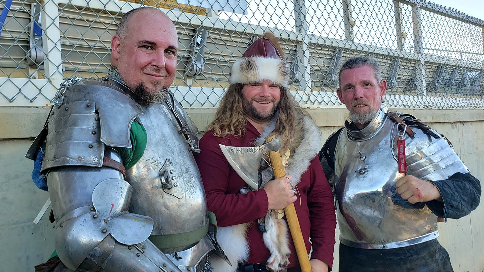 TJ Duquette, left, with Knights of Valor Caol La Darna dressed as an Anglo Saxon, and Viking Larry Dupler — all Knights of Valor members — pose for a photo.