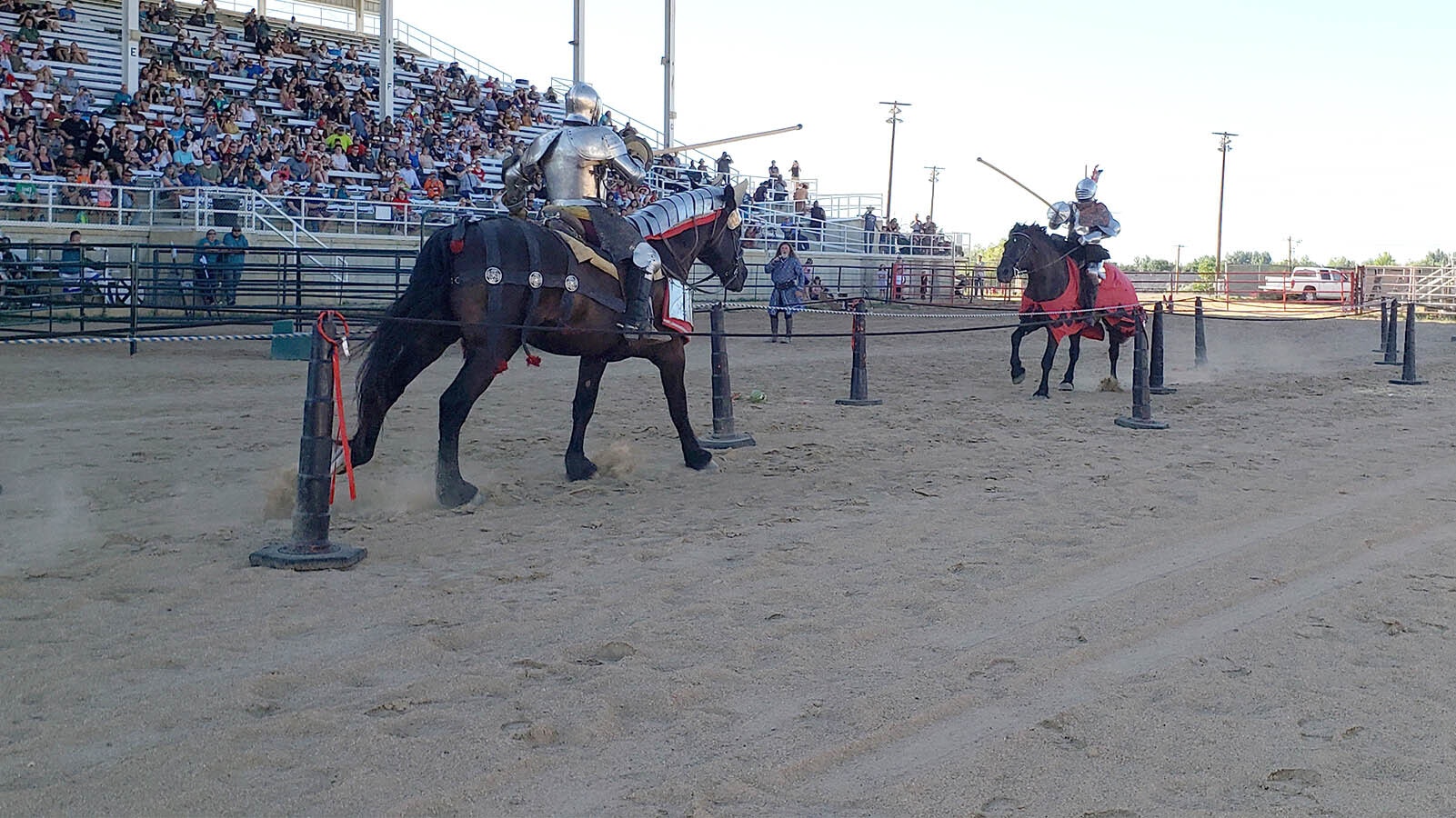 Two knights charge each other at full speed, lances at the ready, during the Tournament of Knights in Sheridan.