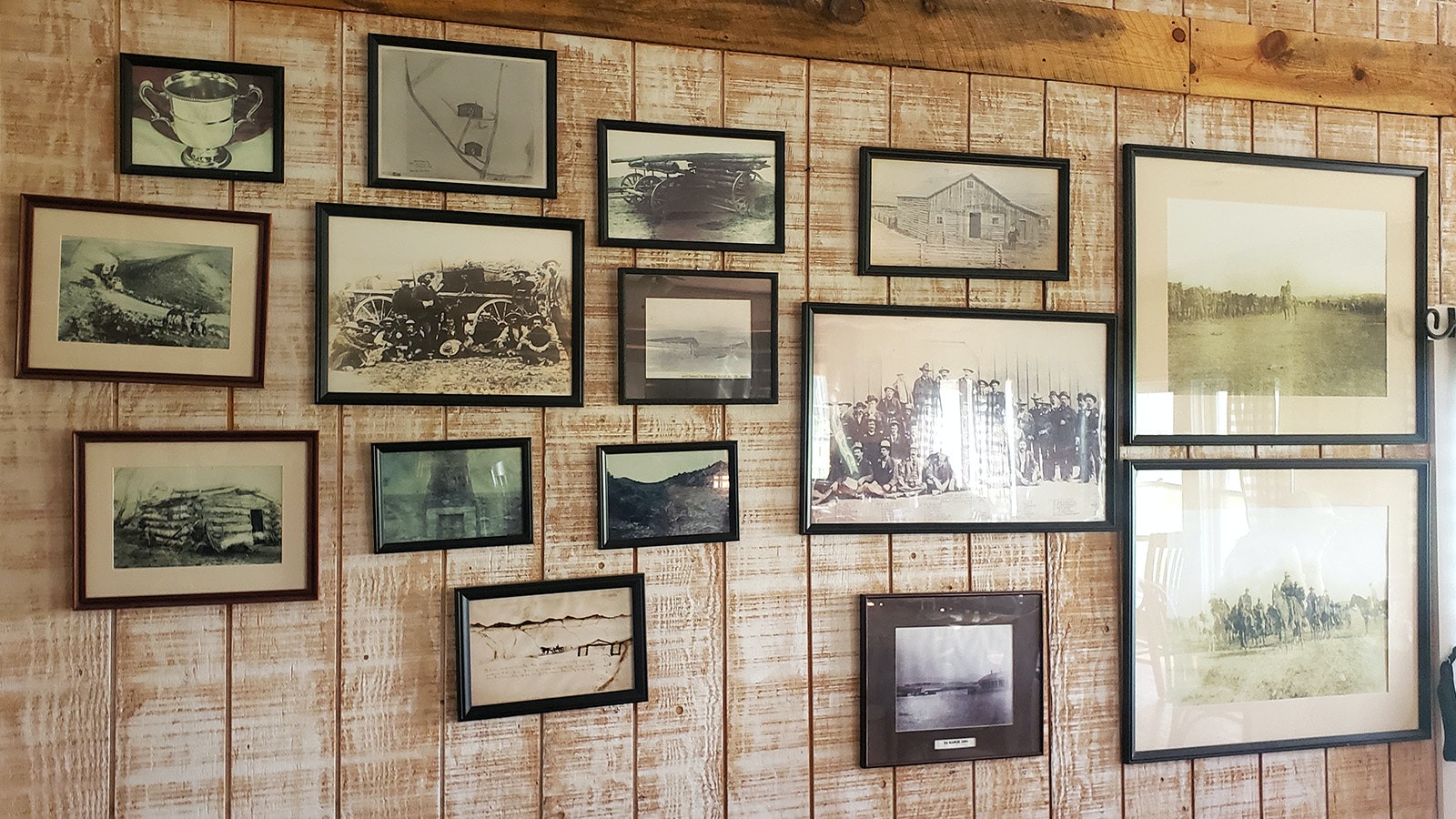 Several photos on the wall of the dining hall shows the ranch during the era of the Johnson County War.